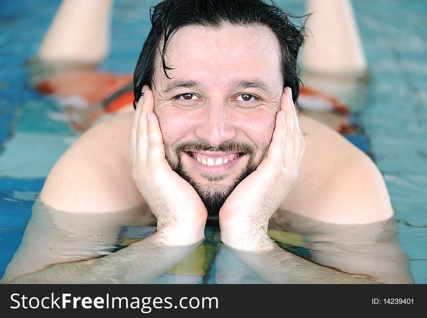 On the pool, happy man