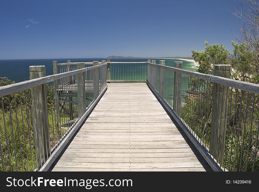 A wooden observation platform overlooking an Australian east coast beach. A wooden observation platform overlooking an Australian east coast beach.