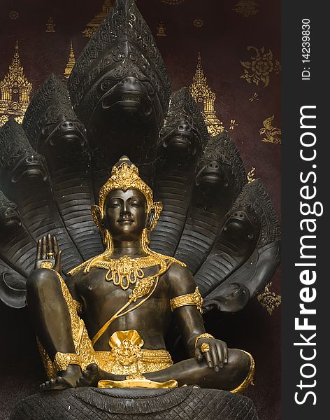 Statue of holy black deity,Thailand