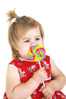 Little Girl With Lollipop Stock Photography