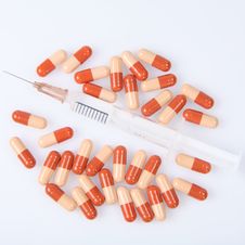 Syringe And Pills Stock Photos