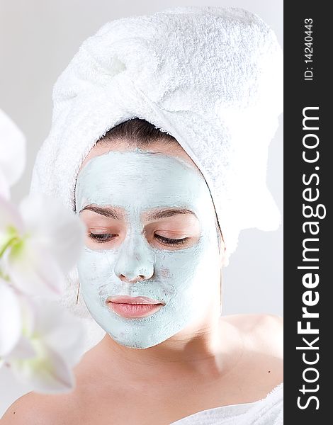 Young female with skincare mask on. Young female with skincare mask on