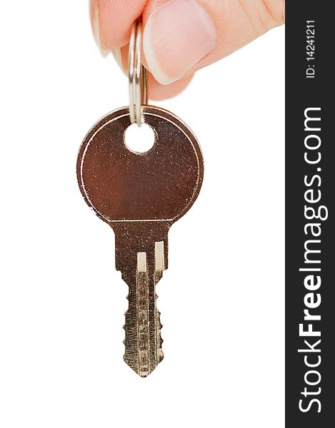 Key in a hand isolated on white background