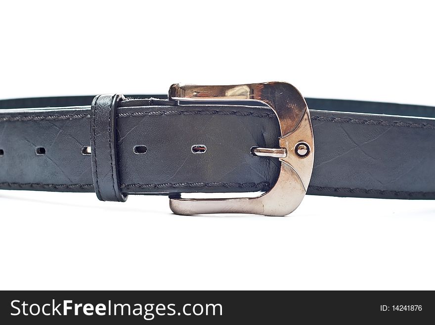 One black leather belt isolated on white. One black leather belt isolated on white