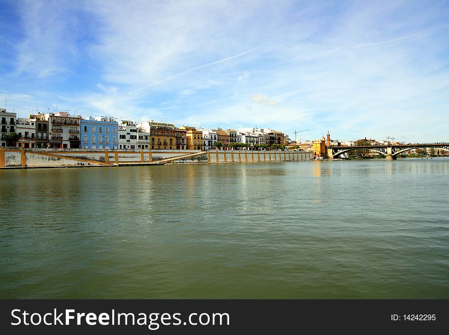 Seville, Guadalquivir river & buildings landscape