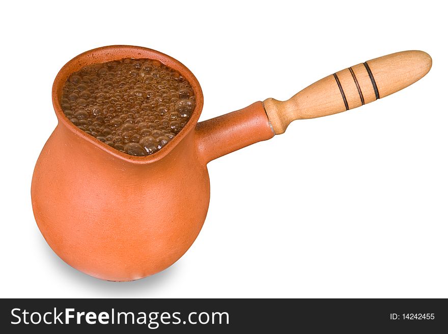 Boiling coffee in a coffee pot it is isolated on a white background