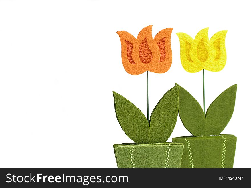 Flower decoration from felt isolated on white background.