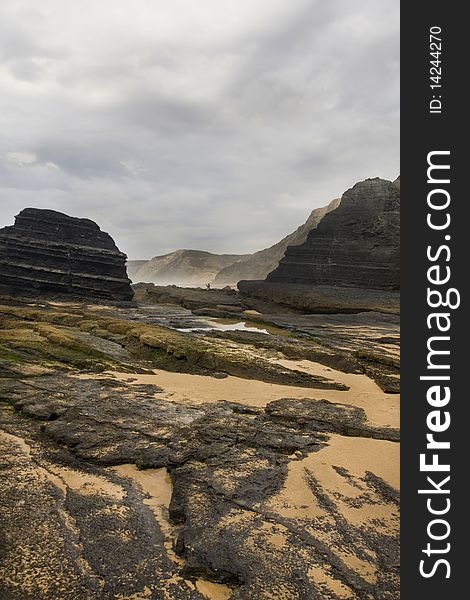 Beautiful view of the rocky beach of Castelejo near Sagres on the Algarve, Portugal. Beautiful view of the rocky beach of Castelejo near Sagres on the Algarve, Portugal.