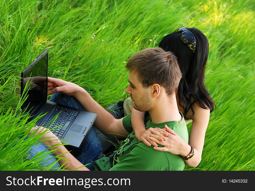 Young Couple With Laptop