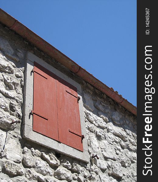 Sun shutters at mediteranian sea on a old house. Sun shutters at mediteranian sea on a old house