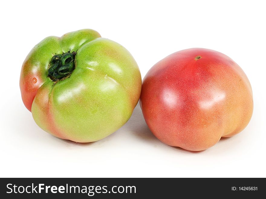 Two tomato isolated on white background