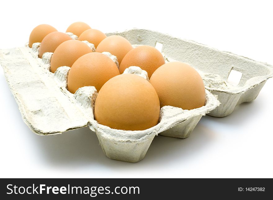 Ten eggs in support  isolated on white background