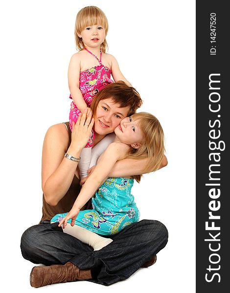 Mother with two daughters on white background