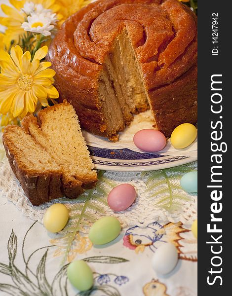 View of a traditional folar cake on the a portuguese table.