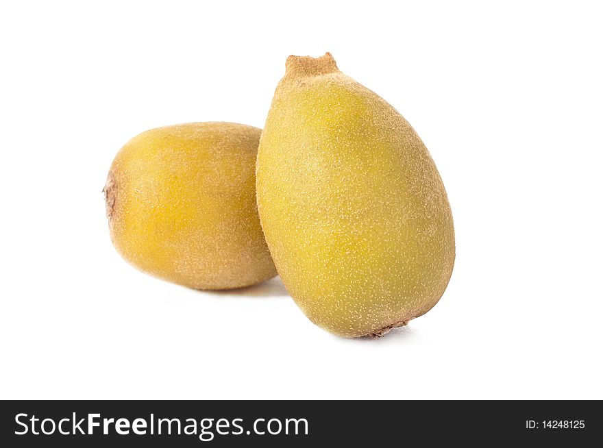 Two golden kiwi fruit on white background