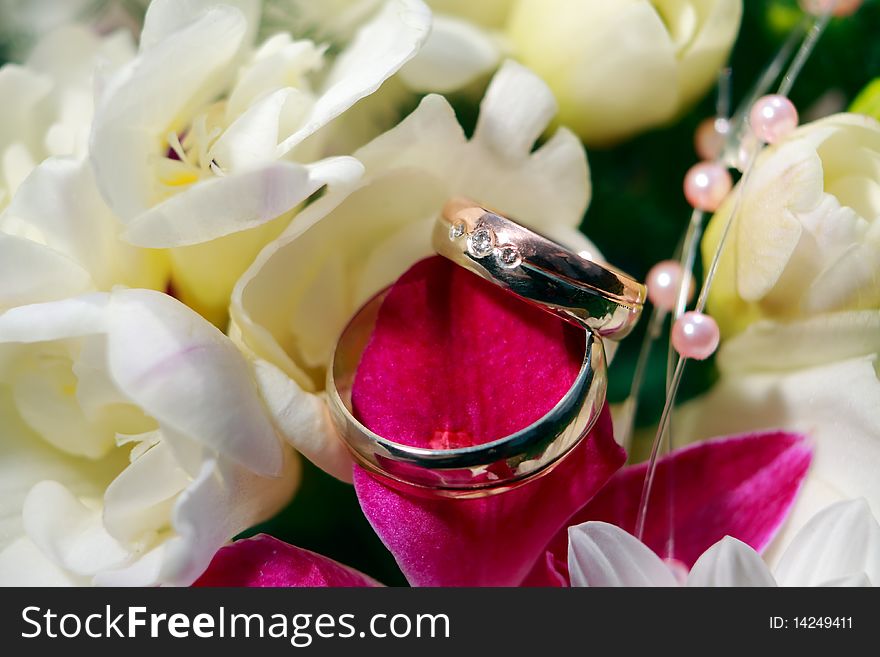Wedding Rings detail with flowers. Wedding Rings detail with flowers
