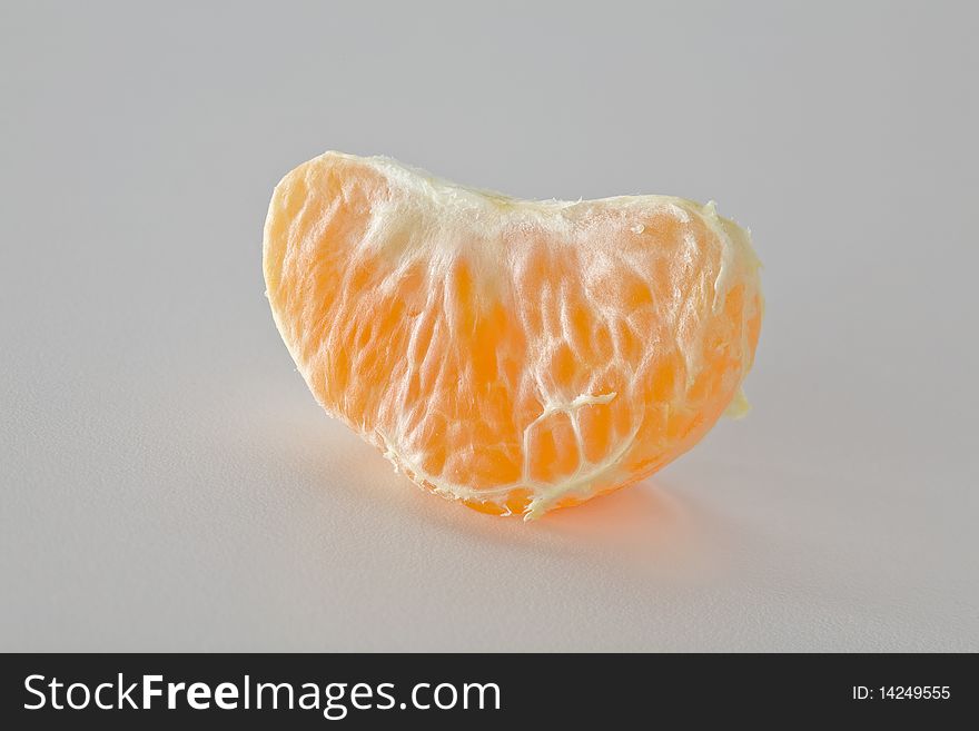 Close up mandarin orange segment isolated
