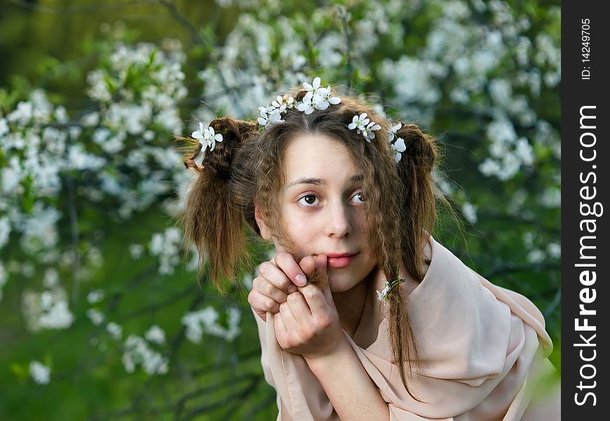 Portrait of beauty young girl with blossom on her hair. Portrait of beauty young girl with blossom on her hair