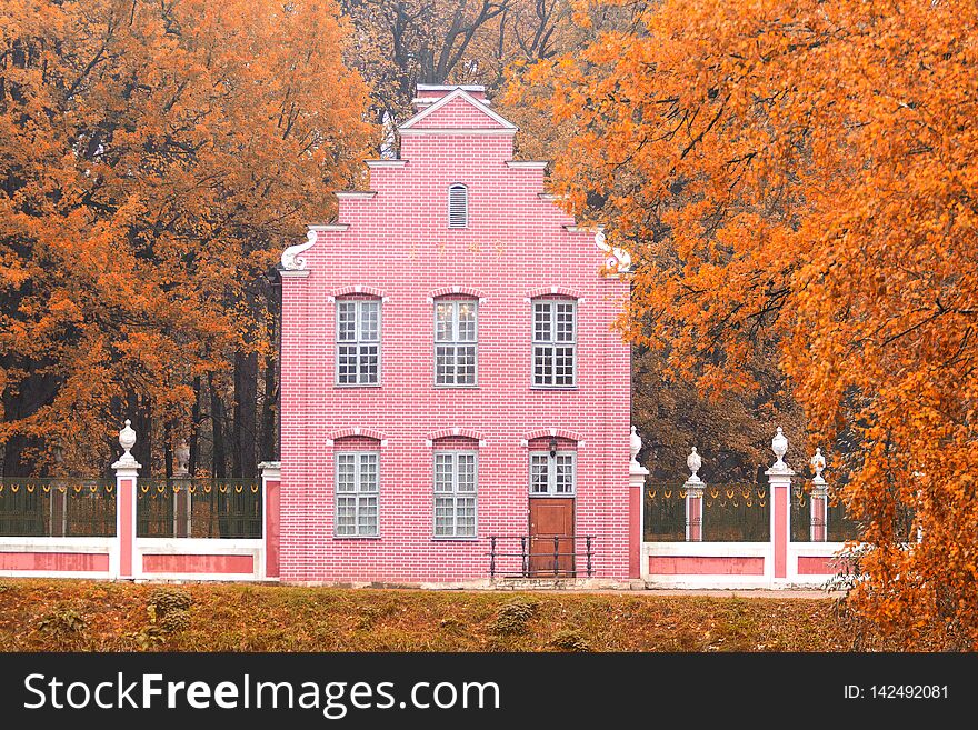 Old Dutch house in the autumn landscape. Kuskovo, Moscow, Russian Federation