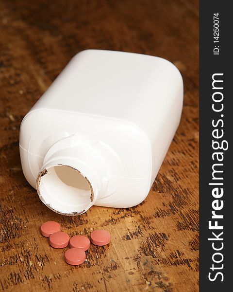 Vitamin tablets on a table studio portrait