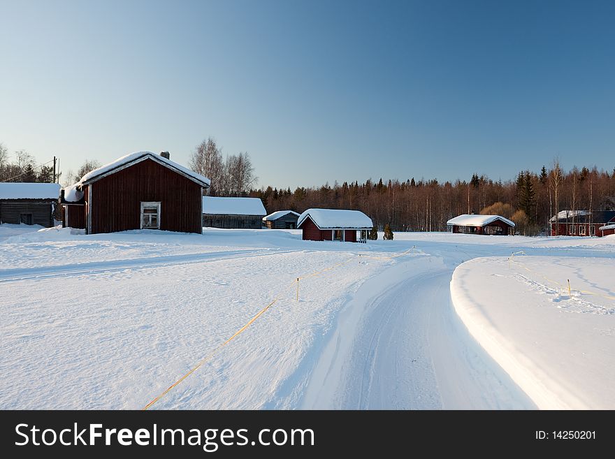 Small wooden houses in winter.