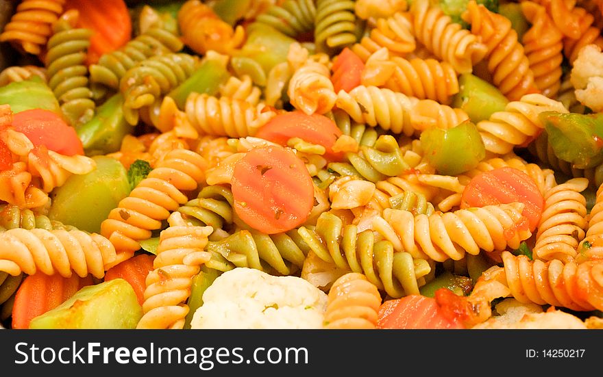 Close up of pasta and vegetable dinner with marinara sauce. Close up of pasta and vegetable dinner with marinara sauce