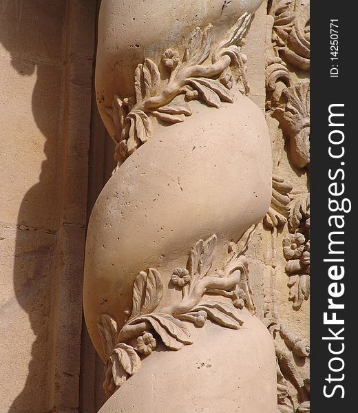 Spiral sandstone sculpture with leaf design. Spiral sandstone sculpture with leaf design