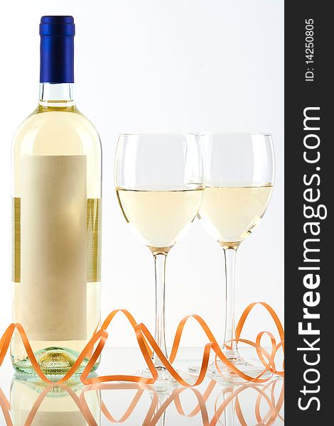 Bottle of white wine and wine glasses