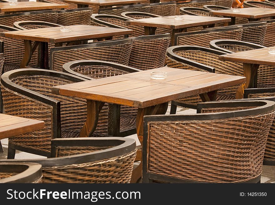 Empty terrace chairs ad table in Sibiu Transylvania Romania