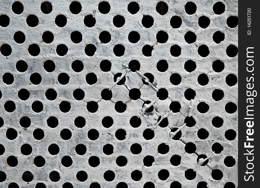Abstract grey background in the form of a grid in a grunge style