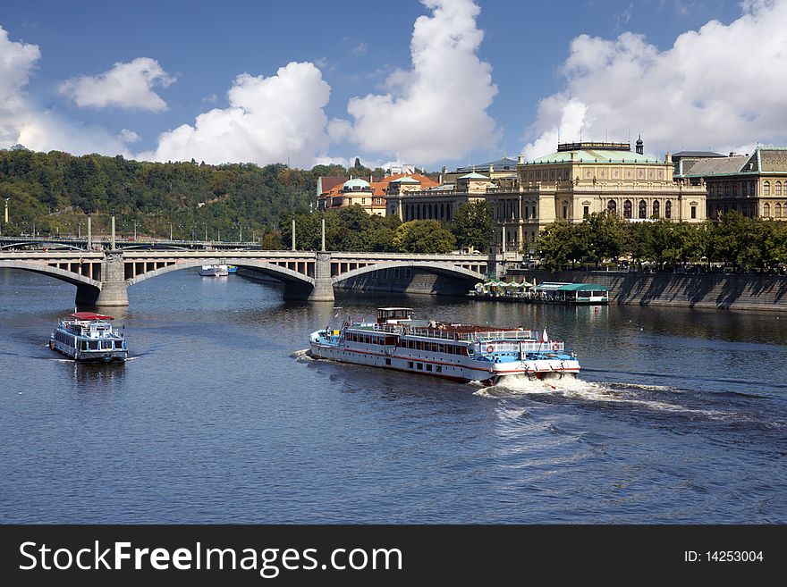 Tourist boat in the river in Prague. Tourist boat in the river in Prague