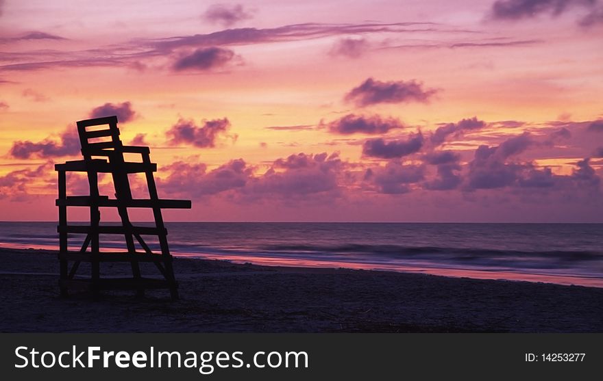 Silhouette of a life guard chair at sunrise. Silhouette of a life guard chair at sunrise