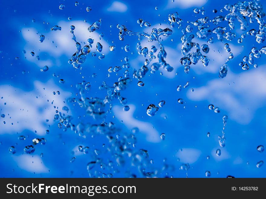 Drops of cold water sprayed into the air. Drops of cold water sprayed into the air