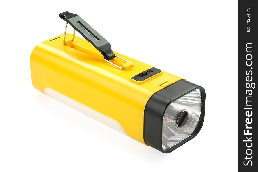 Battery yellow flashlight isolated over white background