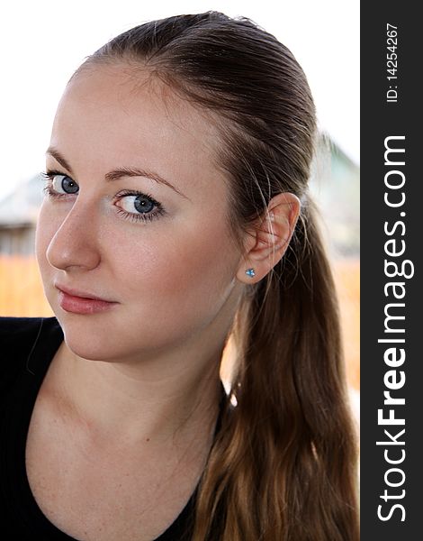 Closeup portrait of a beautiful young woman