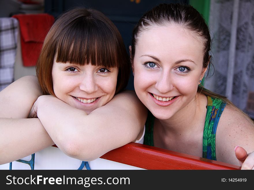 Two happy young women - closeup. Two happy young women - closeup
