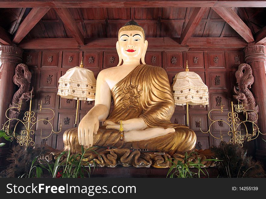 Blissful buddha sit in wood house