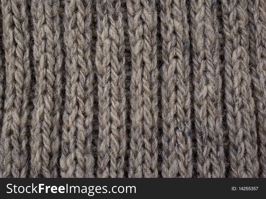 Woolen texture-abstract background from sewing knitting needle