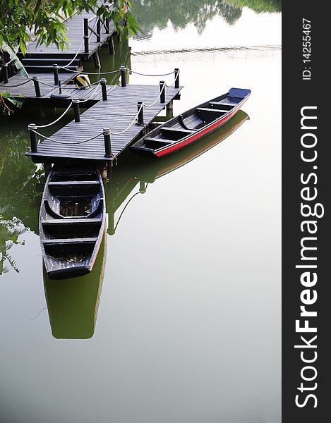 Two boat in waterside, lake in China.