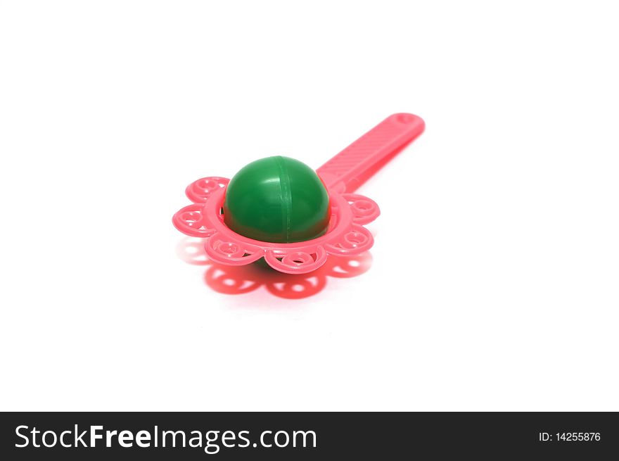Photo of the rattle on white background