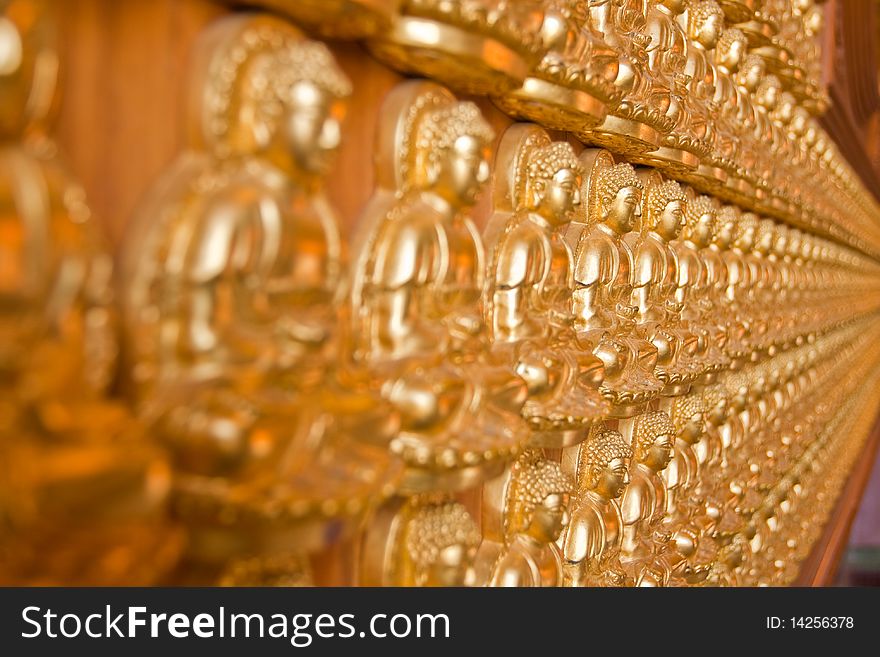 Ten thousand buddha on Chinese temple wall, near bangkok Thailand