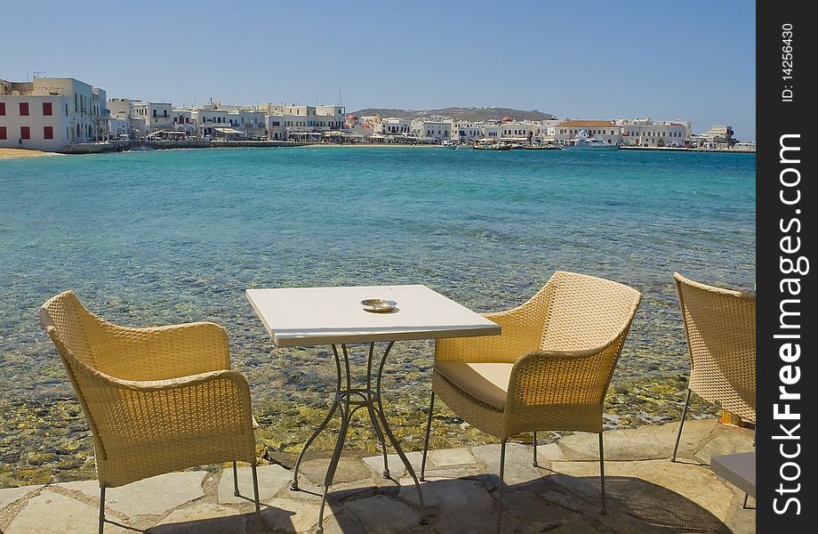 Wicker Chairs In Cafeteria Near The Sea On Island