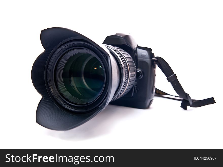 Modern camera with zoom lens isolated on white background