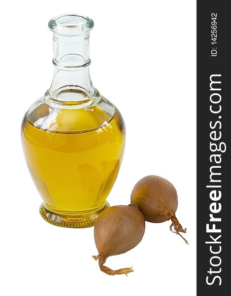 Bottle of olive oil with onion, isolated