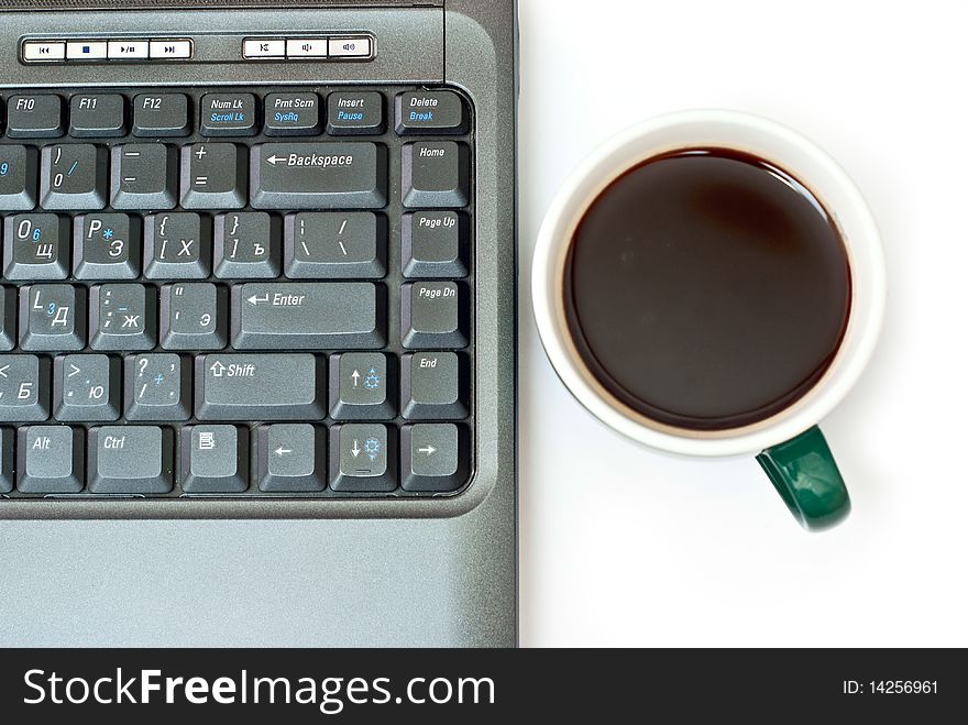 Fresh hot coffe and black notebook isolated on white. Fresh hot coffe and black notebook isolated on white