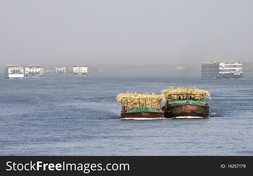 Cruise ships and crop boat on the Nile River. Cruise ships and crop boat on the Nile River