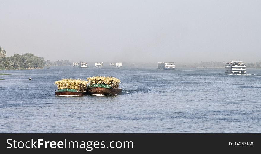 Cruise ships and crop boat on the Nile River. Cruise ships and crop boat on the Nile River