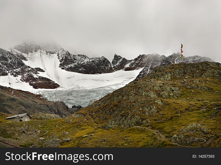 Glaciers And Hiking Trails In The Swiss Alps