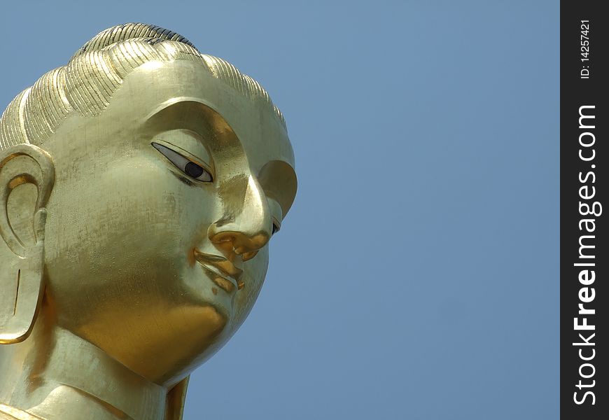 The face of the big Buddha image in Prachuabkirikhan Province, Thailand. The face of the big Buddha image in Prachuabkirikhan Province, Thailand