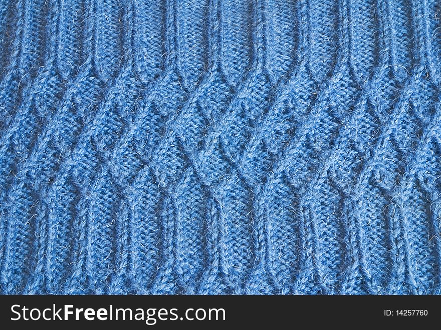 Knitted textural background close up. Knitted textural background close up